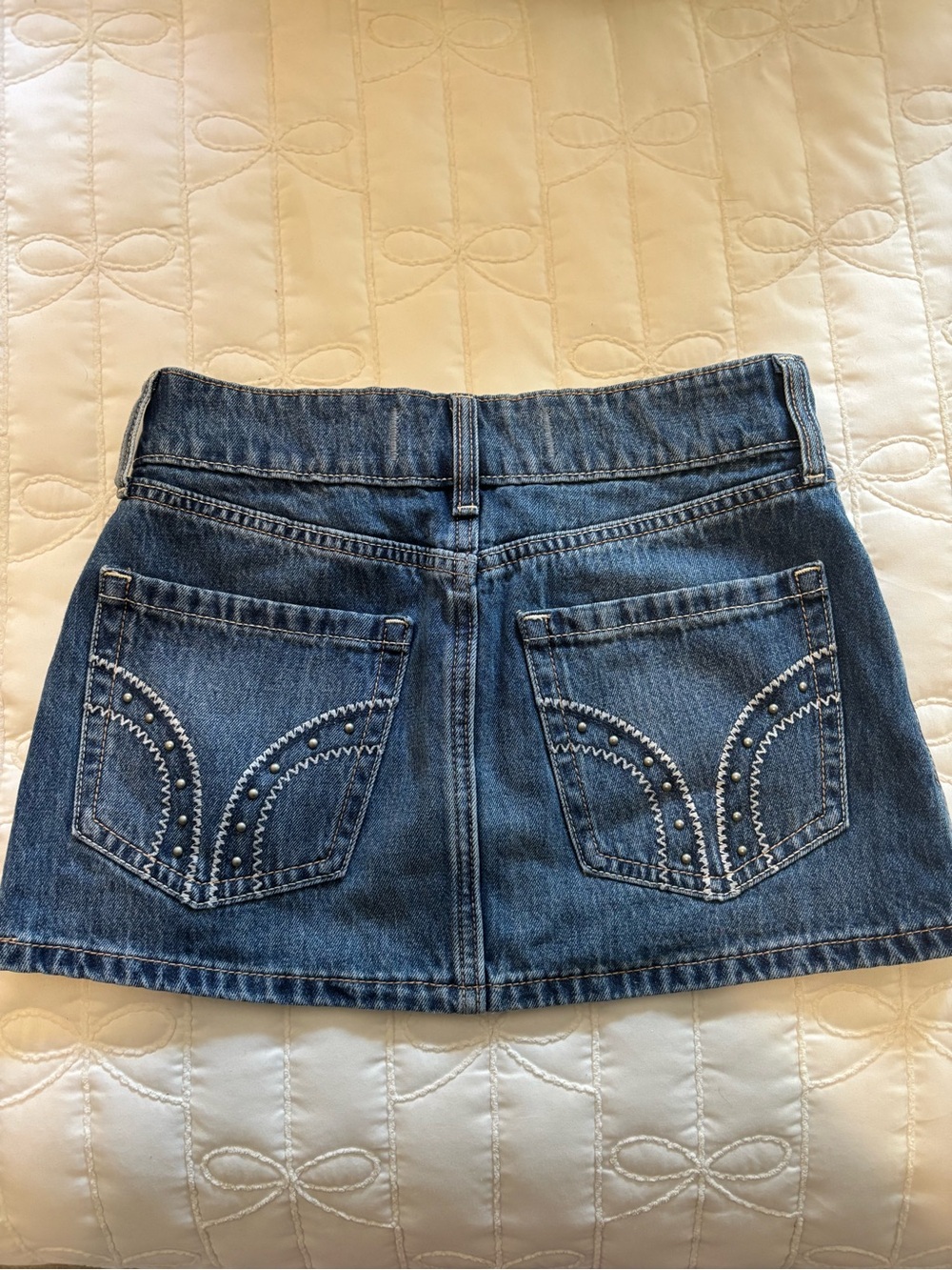 Hollister Denim Mini Skirt in Blue with Studded Pocket Detail
